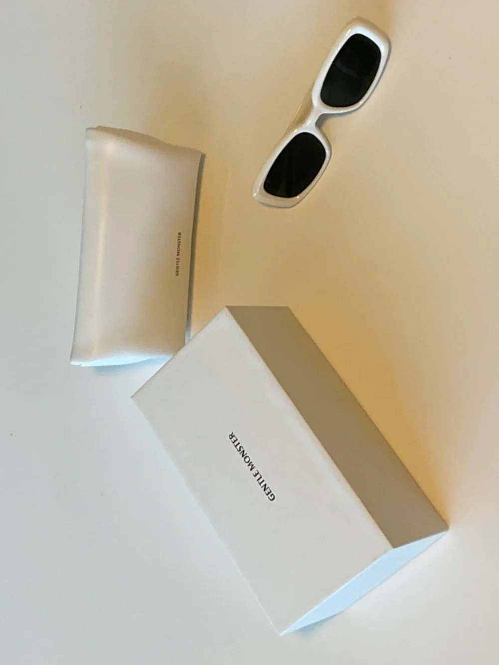 GENTLE MONSTER Glossy White Slim Rectangular Sunglasses